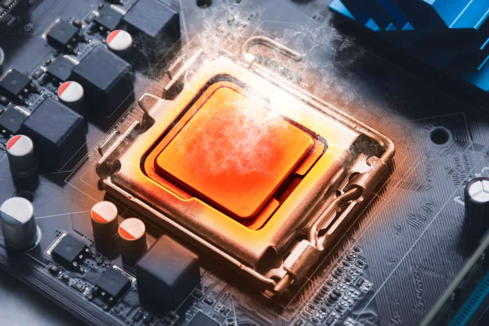 The CPU processor chip overheats and burns in the socket on the computer motherboard